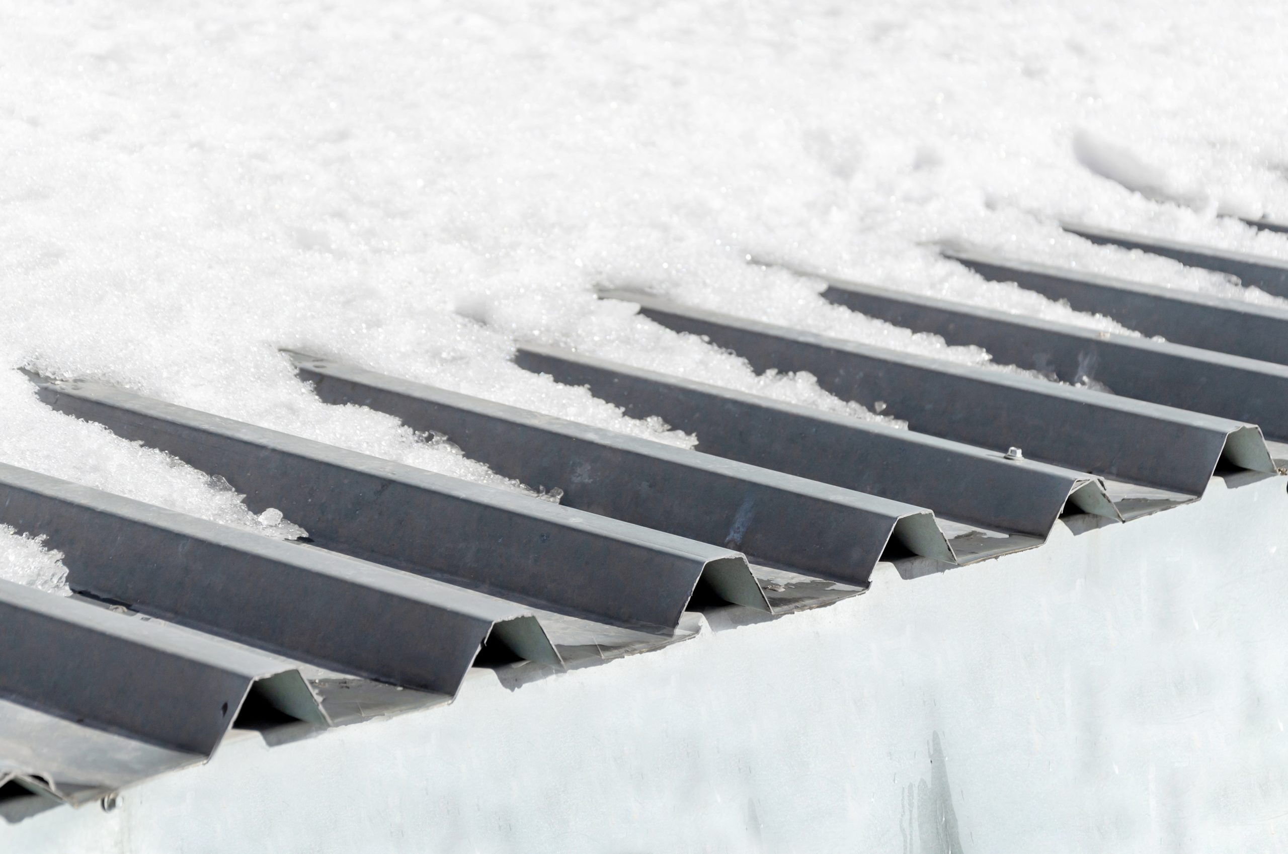 How snow and ice affect your commercial roof